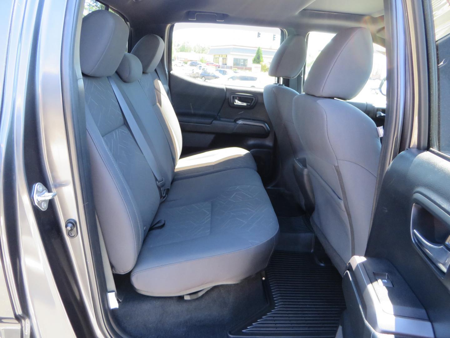 2017 CHARCOAL /GREY Toyota Tacoma TRD OFF-ROAD Double Cab Long Bed V6 6AT 4WD (3TMDZ5BN3HM) with an 3.5L V6 engine, automatic transmission, located at 2630 Grass Valley Highway, Auburn, CA, 95603, (530) 508-5100, 38.937893, -121.095482 - TRD Off-road Tacoma with a level kit, 17" Fuel Vector wheels, Falken Wildpeak AT tires, N-Fab running boards, Roll Up tonneau cover, BedRug, and window Deflectors. - Photo#50